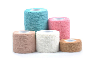 Enveloppement de bandage auto-adhésif en coton
